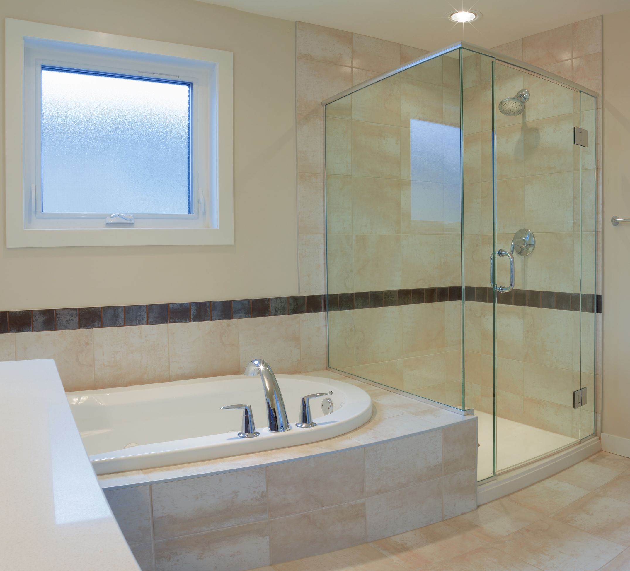A Custom Glass Shower Enclosure in Roselle, IL Creates a Certain Ambiance for Your Bathroom